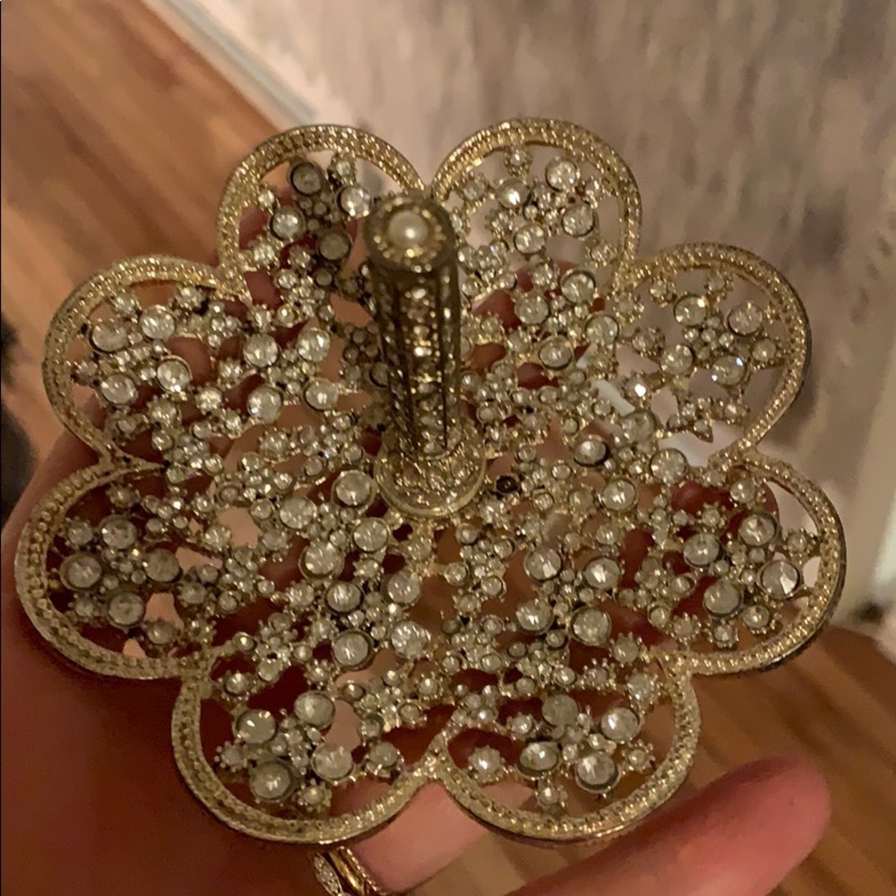 Silver studded ring holder